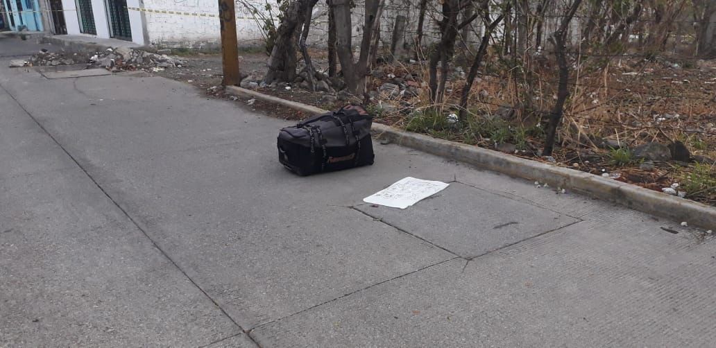 Dejan cadáver en una maleta en Temixco, Morelos