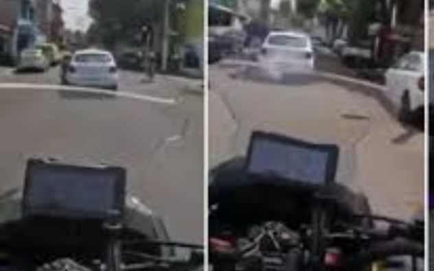 Taxista arrastra a policía
