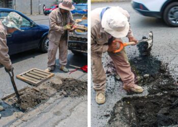 Trabajadores de servicios públicos retirando basura y lodo de una rejilla pluvial en Cuernavaca, Morelos